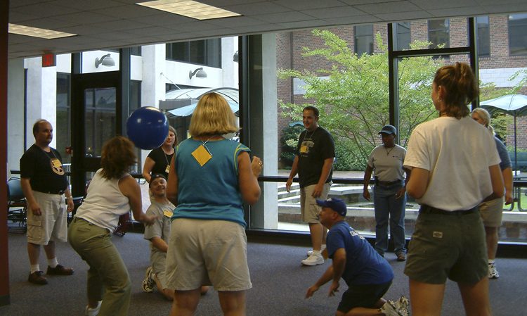 The teachers participating in Furman's PEAKS Rope Course that teaches goal-setting and cooperative decision-making