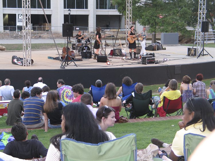 The group attending the Reedy River Concert Series in downtown Greenville