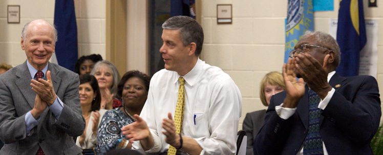 Arne Duncan speaking at event