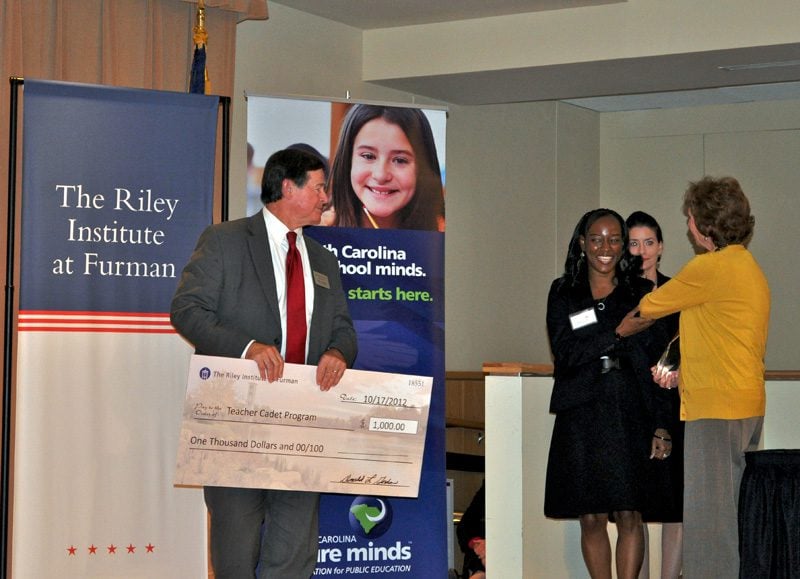 Marcella Wine-Snyder accepting the award for The Teacher Cadet Program from Rose Sheheen, South Carolina State Board of Education