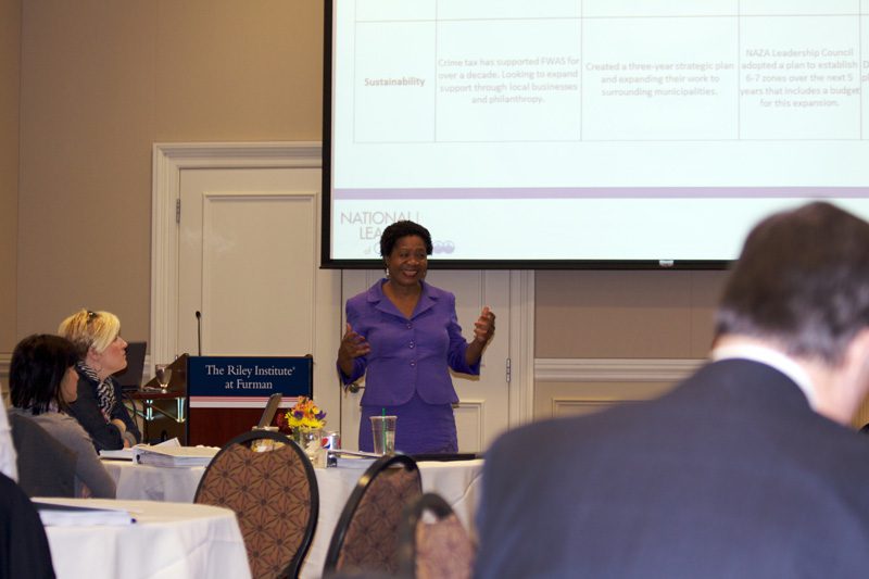 Audrey Hutchinson, National League of Cities, taking an in-depth look at the investments and strategies used by three cities of varying sizes and demographics