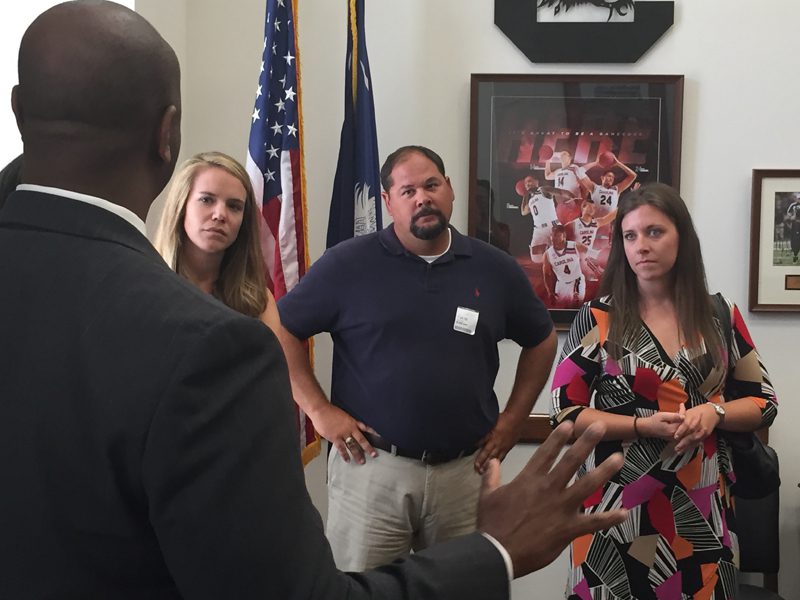 Teachers of Government meeting with S.C. Senator Tim Scott (l-r) Ali Hendrick, Steve Legette, Kristine Anderson