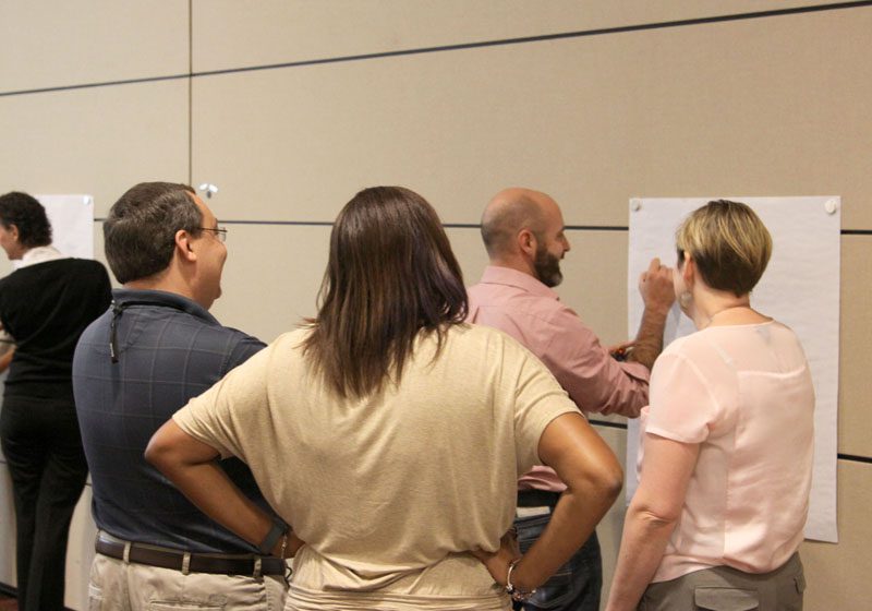 2015 White-Riley-Peterson policy Fellows in small group discussion