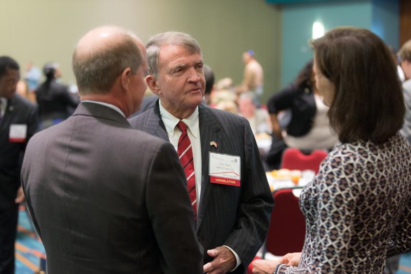 Trip Dubard, Executive Director, South Carolina Future Minds and Jacki Martin speaking with SC Senator John Courson