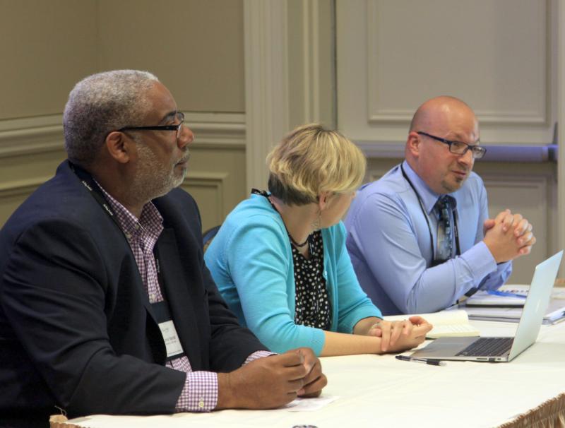 White-Riley-Peterson alums Lemar Marshall, Alison Reis-Khanna, and Joseph Morra addressing the Fellows