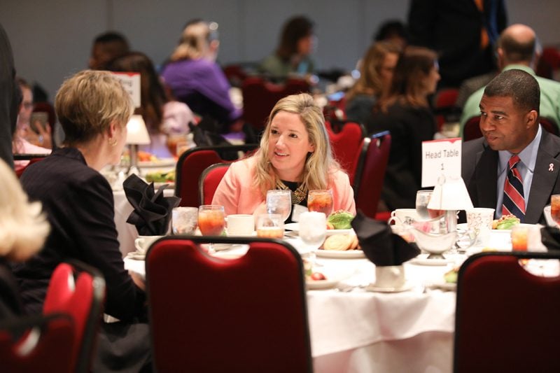 Caroline Mauldin, Executive Director of South Carolina Future Minds, with Gerrita Postlewait and Russell Booker