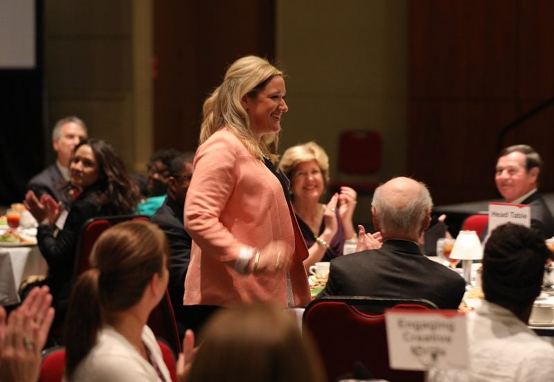 Caroline Mauldin being recognized by the audience