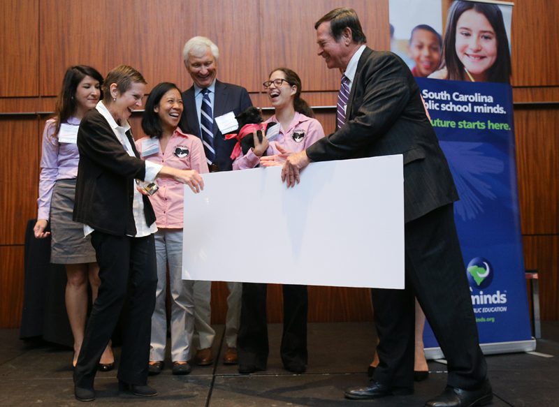 Don Gordon presenting the cash award