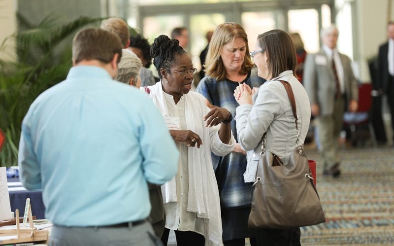 Blondelle Tolliver speaking with Susan Antonelli both with the Engaging Creative Minds' team