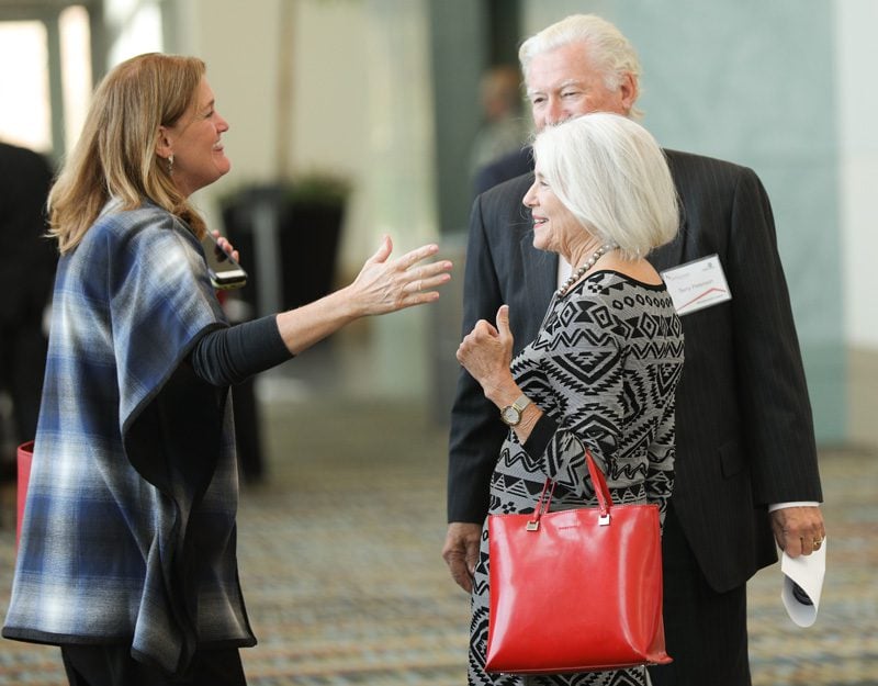 Robin Berlinsky, Engaging Creative Minds, greeting Scott Shanklin-Peterson and Terry Peterson