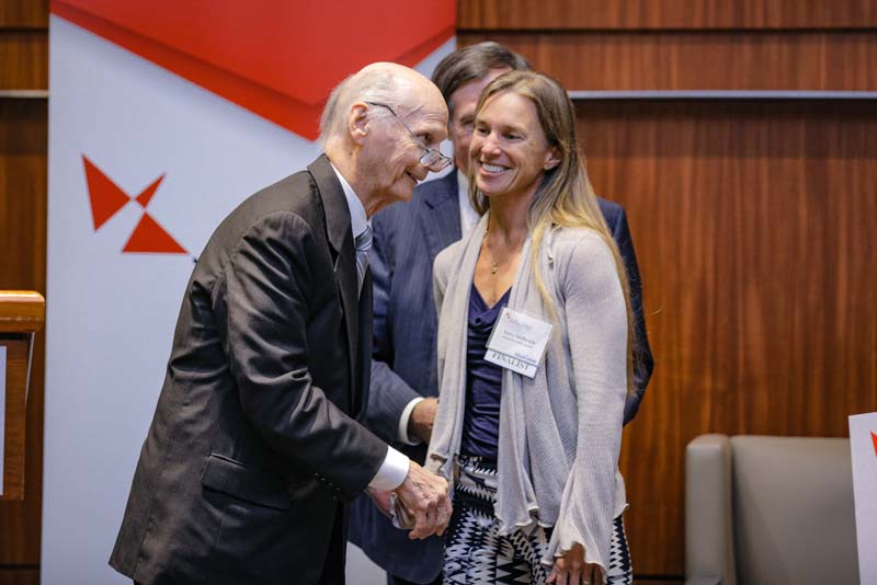 Secretary Riley congratulating Jackie Cassidy, a member of Grow to Greatness, formerly Farm to Belly