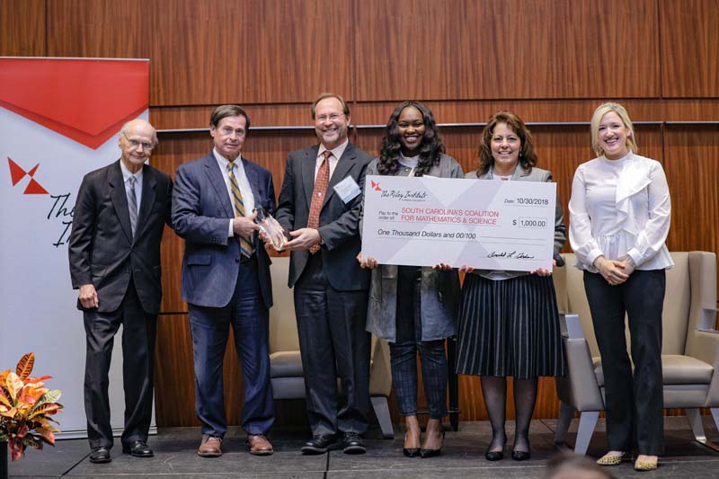 Finalist South Carolina's Coalition for Mathematics & Science (SCCMS) accepting their cash award (l-r): Secretary Riley, Don Gordon, Tom Peters, Kelsye Acker, Carmelina Livingston and Caroline Mauldin