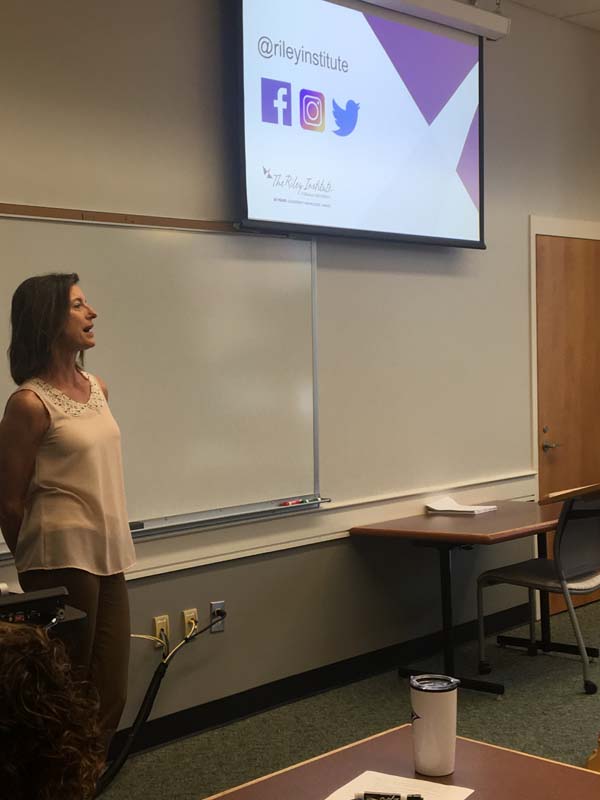 Jacki Martin, Deputy Director of the Riley Institute, speaking to the group about the Riley Institute