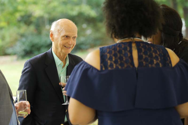 Secretary Riley speaking with Fellows