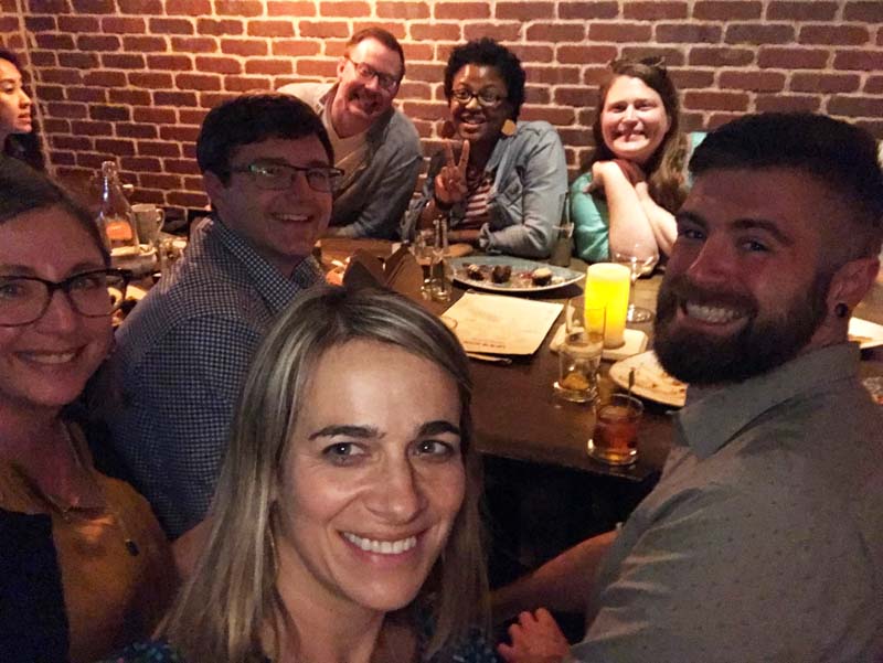 Forefront: Cathy Stevens; Row 1 (l-r): Kate Foster, Robert Dorigo Jones, Brent Balog; Row 2 (l-r): Brandon Hutton, Charmaine Davis-Bey and Heather May