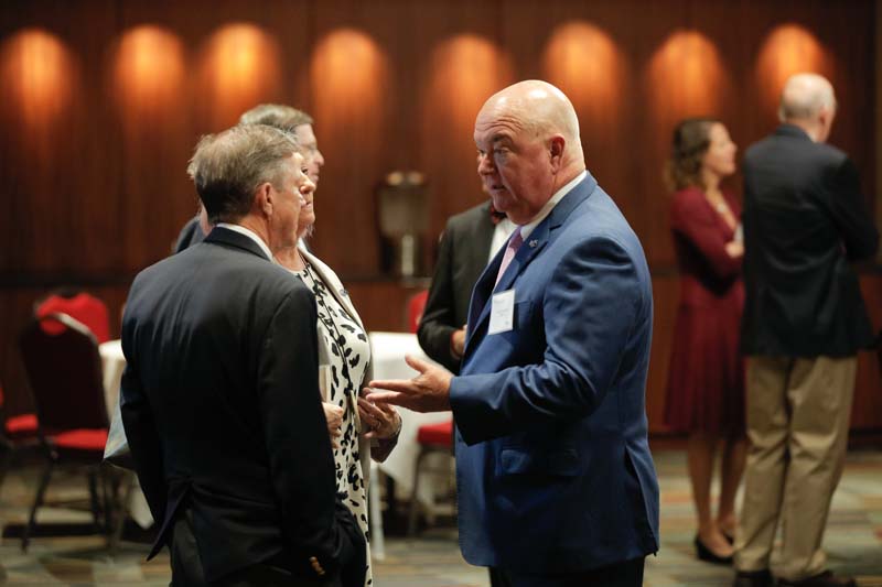 Chuck Saylors, South Carolina School Boards Association, speaking with guests