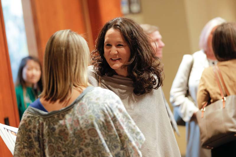 Debbie Elmore, South Carolina School Boards Association, speaking with Cathy Stevens