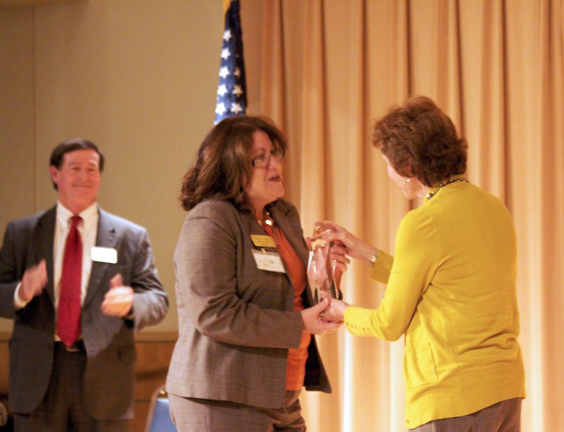 Dena Dunlap accepts the Honorable Mention award for Chester Park Elementary School of Inquiry, Chester County Schools, from Rose Sheheen, South Carolina State Board of Education