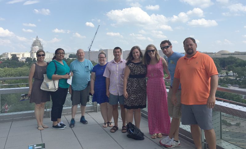 Teachers of Government overlooking the Capitol Building (l-r) Liz Smith, Charly Adkinson, Gene Kennedy, Julia Stanley, Paul Drohomirecky, Kristine Anderson, Ali Hendrick, Rob Phillips, Steve Legette