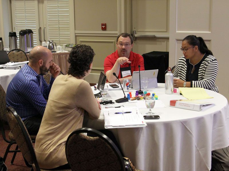 2015 White-Riley-Peterson policy Fellows in small group discussion