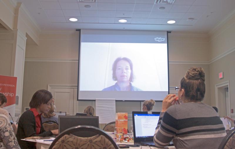 Jen Rinehart speaking to Fellows via Skype