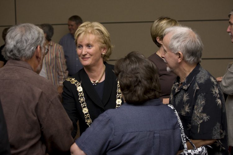 Eibhlin Byrne with audience members after the address
