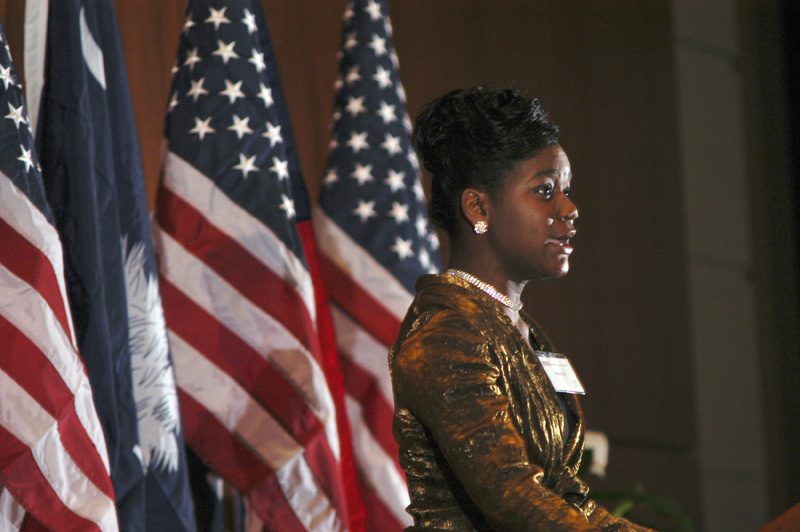 Ashley Grier, from the South Carolina Governor’s School for the Arts and Humanities, sings the National Anthem