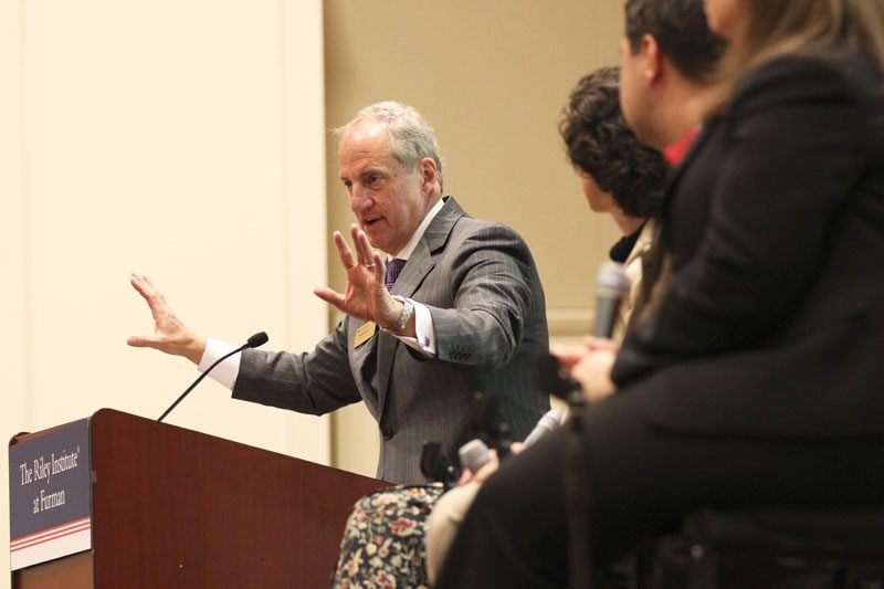 Furman University President Rod Smolla moderating the panel discussion, 