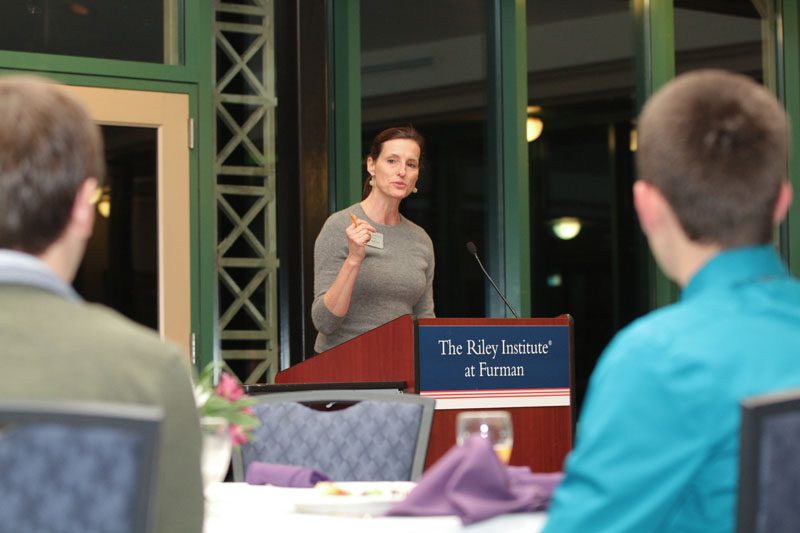 Jacki Martin, Riley Institute Associate Director, introducing the guest speaker Anton Gunn