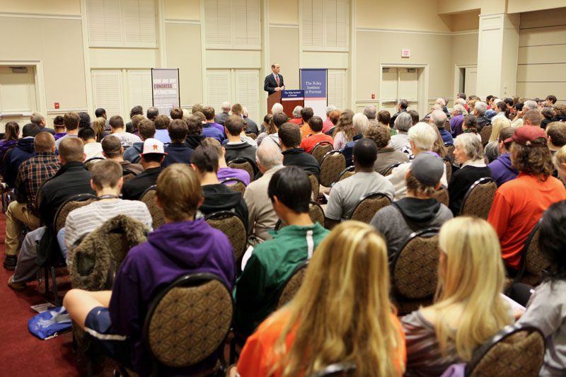 Baldacci speaking to a full house