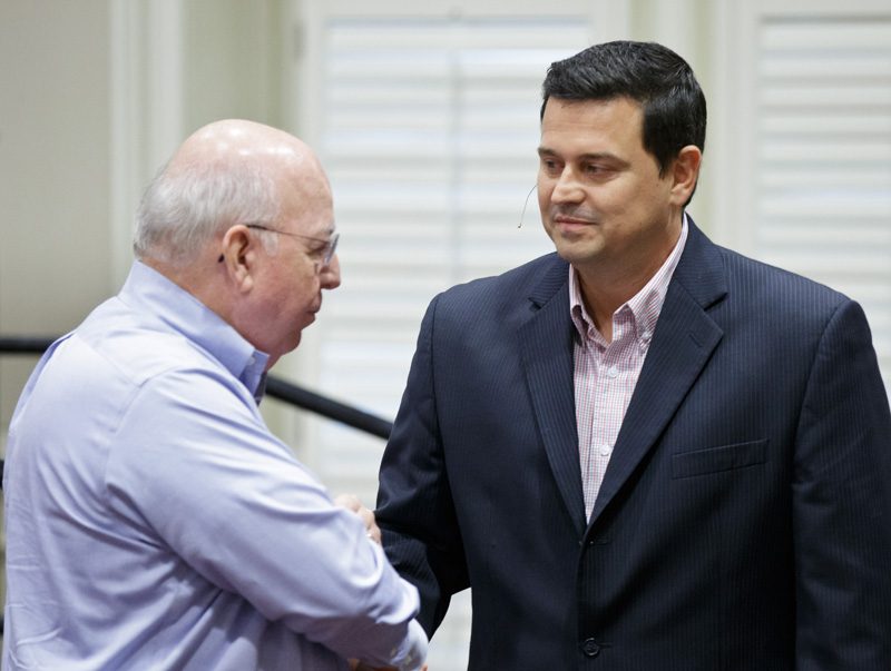 Mark Quinn visiting with a guest