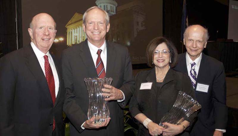 (l-r) David Wilkins, James Harrison, Anita Zucker and Secretary Riley