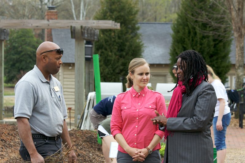 Bruce Adams, Shi Center Farm Manager, Yancey Fouché, Associate Director of the Shi Center and Ambassador Robin Sanders