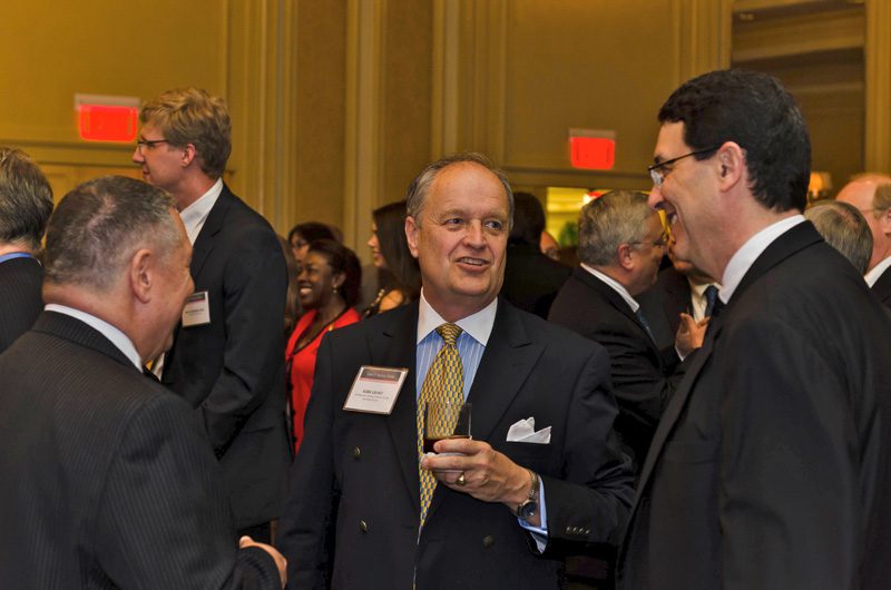 Kirk Grant, center at the reception to honor Justice O’Connor was held at the Charleston Place Hotel