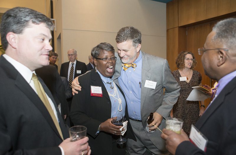 Dan Cooper giving Gilda Cobb-Hunter a hug