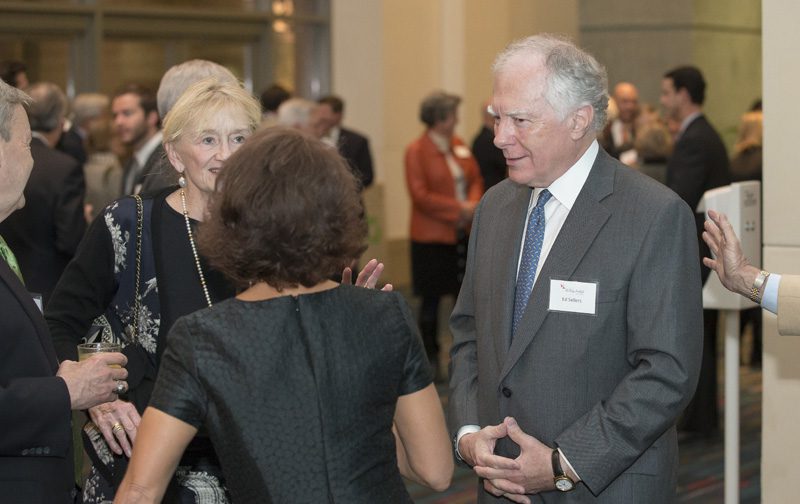 Ed Sellers and his wife speaking with other guests
