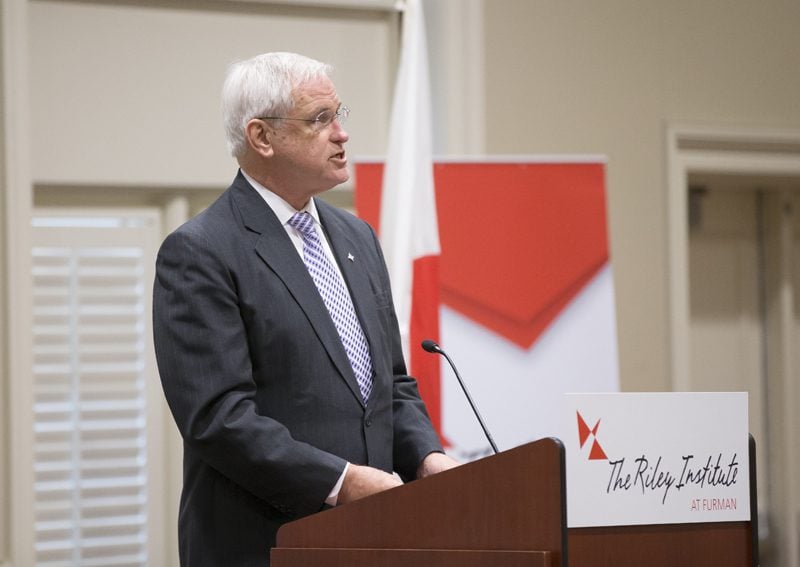 Furman's Interim President Carl Kohrt welcoming and introducing the International Symposium's keynote speaker