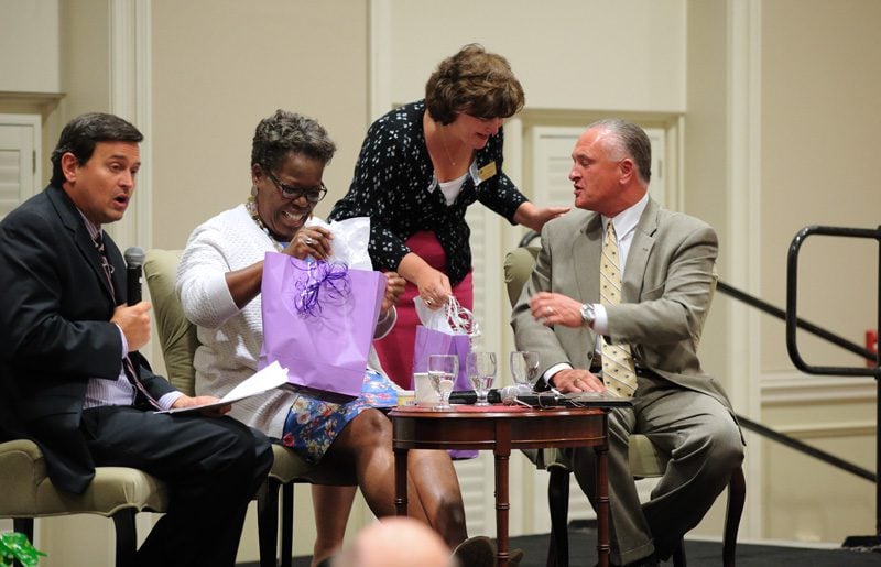 Nancy Kennedy, Director of OLLI @ Furman, presenting gifts to our guest speakers