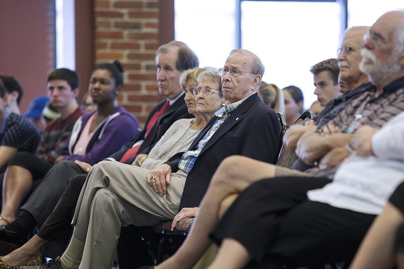 Crowd listening to Hollman's public remarks