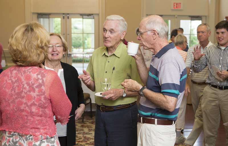 Guests mingling at the break