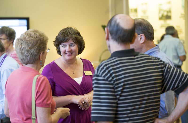 Nancy Kennedy, Director, OLLI @ Furman, mingling with guests