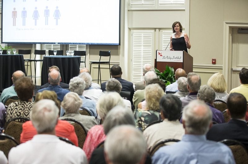 Carol Naughton speaking about 