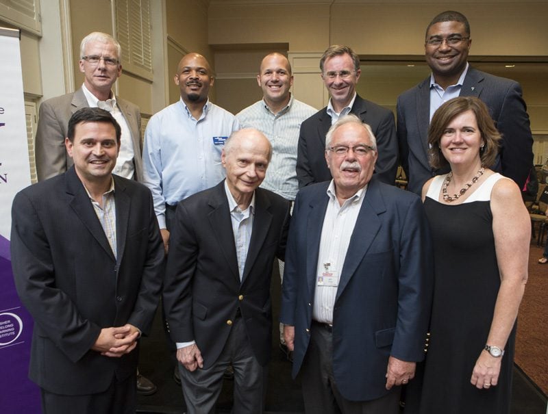 (l-r) Row 1: Mark Quinn, Secretary Riley, Jim Sinegal, Carol Naughton; Row 2: David Wood, Tony Thomas, Curt McPhail, Phil Feisal and Russell Booker