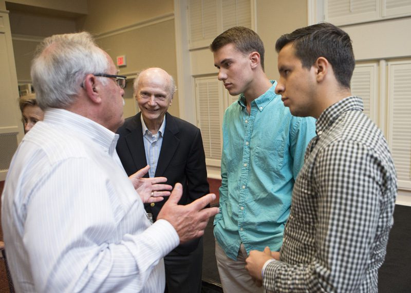 Furman students conversing with Jim Sinegal and Secretary Riley