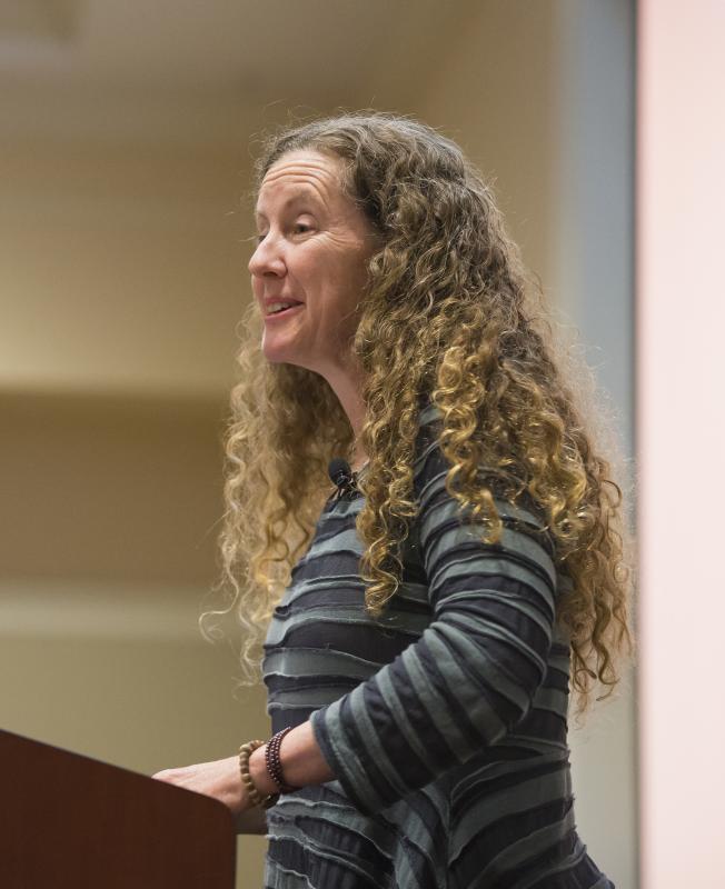 Jennifer Turner delivering her remarks about 