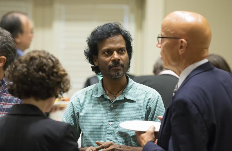Stevan Harrell continuing the conversation with the audience members