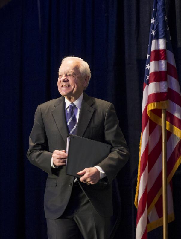 Bob Schieffer preparing to take the podium