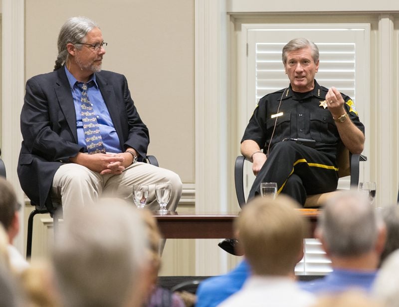 (l-r) Glenn Smith and Sheriff Leon Lott continuing the conversation
