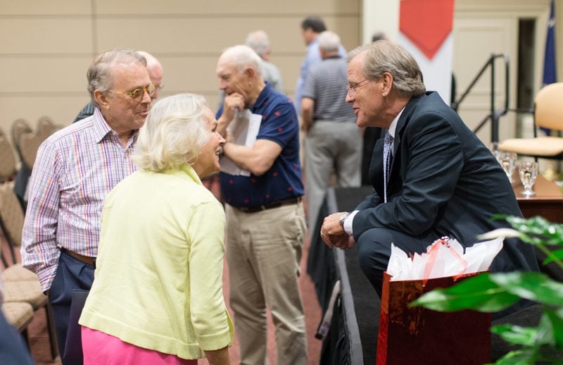 Stuart Andrews speaking with guests