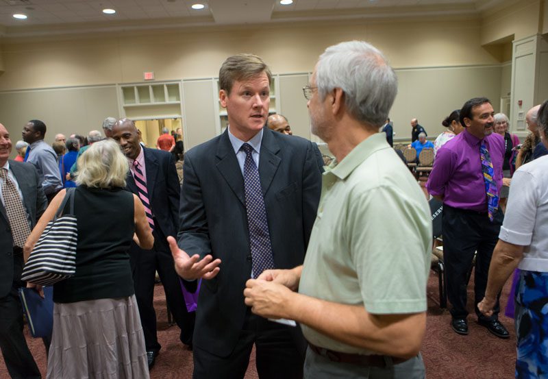 Kirby Mitchell further discussing the issues with a guest